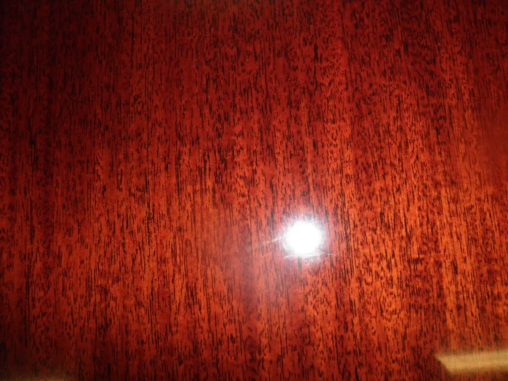 Piano Finish Dining Table — Chandelier Damage Repair — After